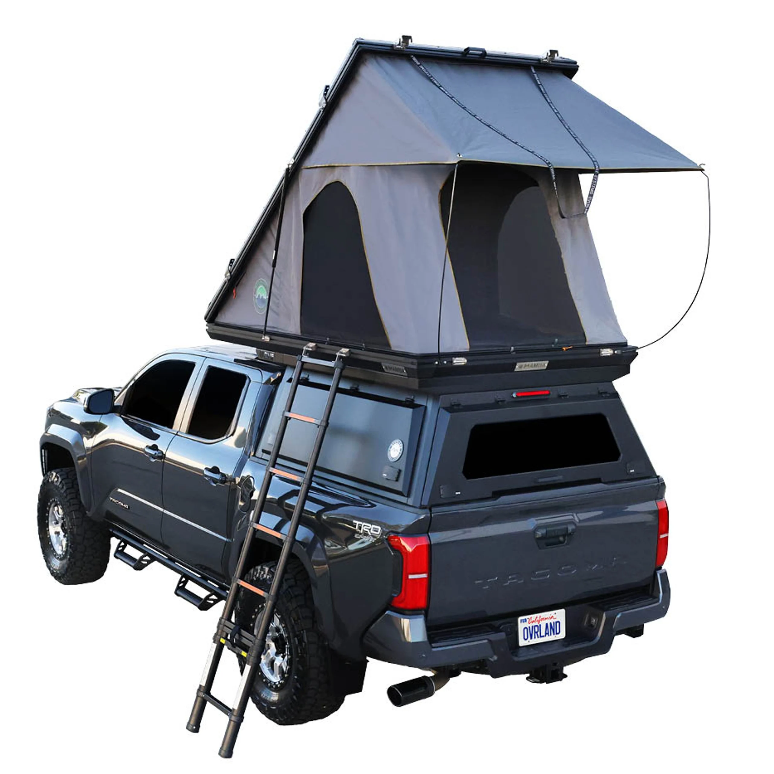 A.R.E. overland truck cap on a pickup set up for camping